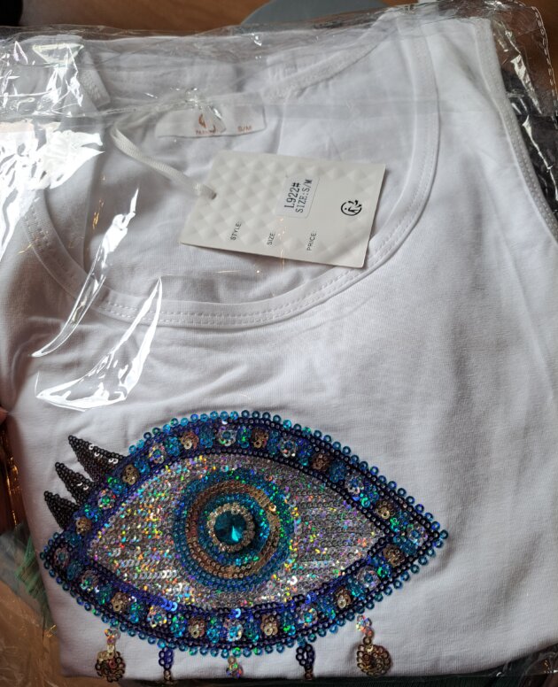 T-shirt neuf blanc avec œil bleu